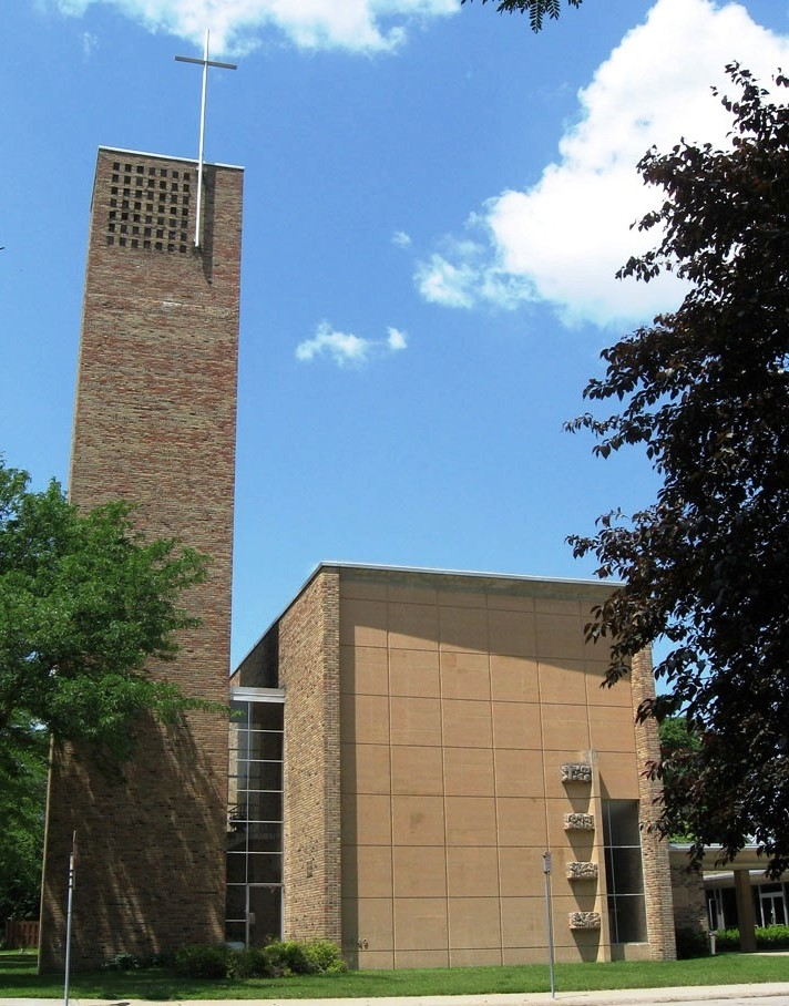 Church of Christ Lutheran Building with a tower and cross at the top.