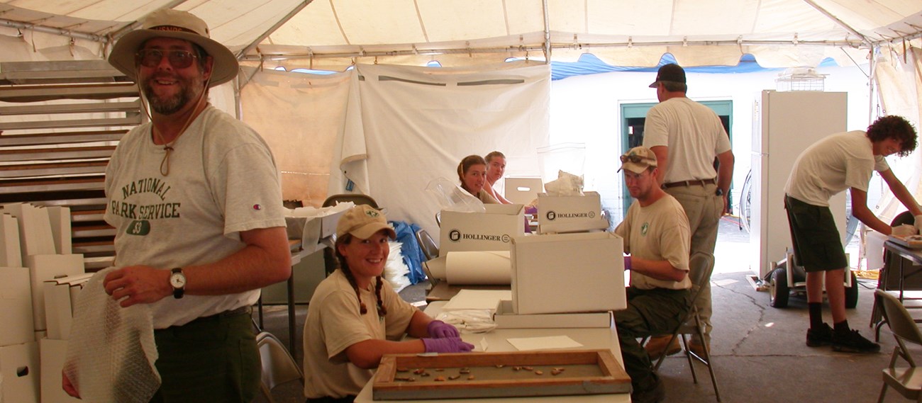 Cultural Resource professionals from the National Park Service work to complete emergency preservation work.