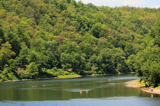 Kayakers enjoy a peaceful paddle down the Middle Delaware National Scenic and Recreational River.