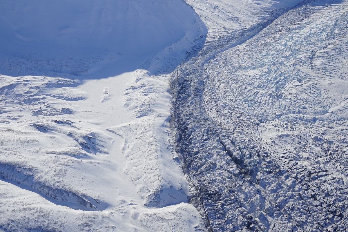 aerial view of crevasses on a glacier