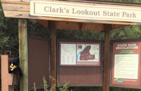 toy dog at information kiosk for Clark's Lookout State Park