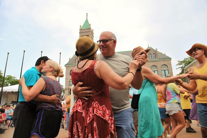Couples dance outside