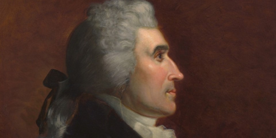 Detail, color portrait of Jonathan Dayton in profile showing his hair pulled back in a queue.