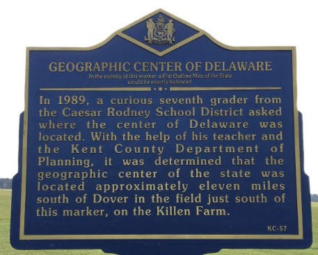 Photo of historic marker that explains how the center of Delaware was located on Killen Farm.