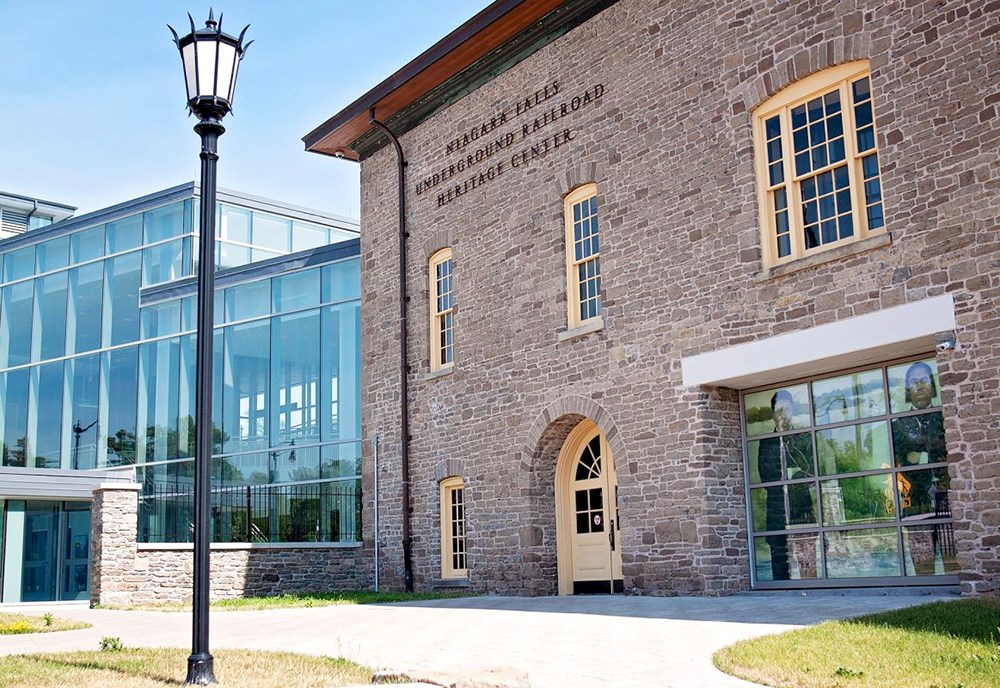 Outside view of the brick and glass exterior of the heritage center.