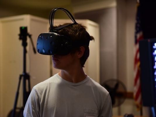 Virtual reality glasses Young man wears virtual reality glasses.