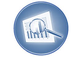 An image of a magnifying glass over a bar chart.