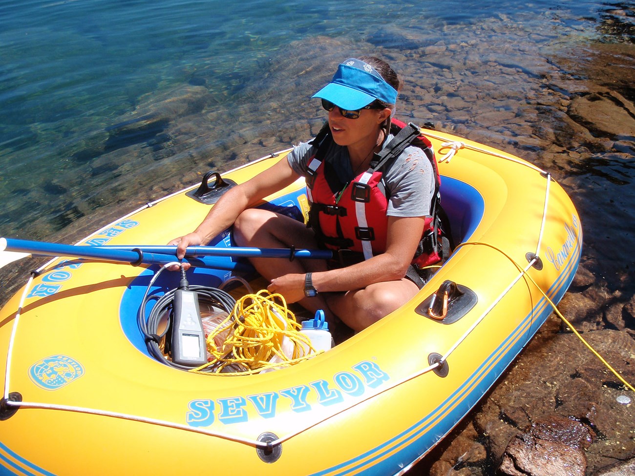 Crew member about to collect mid-lake water samples