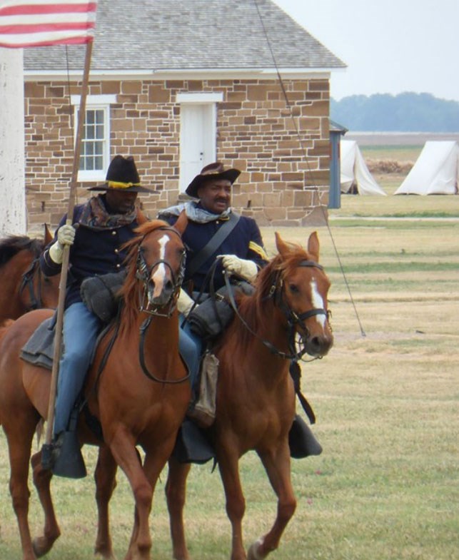 soldiers on horseback in reenactment