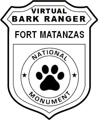 Image of a arrowhead. Inside it says, "Fort Matanzas Virtual Bark Ranger" and there is a second image of a paw print.
