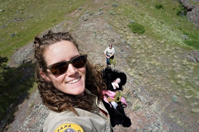FP 11 ranger taking a selfie with a stuffed pup