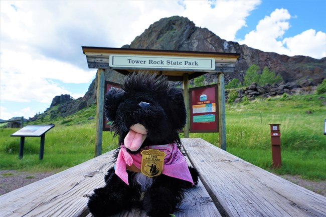 FP 7 stuffed pup near Tower Rock State Park sign