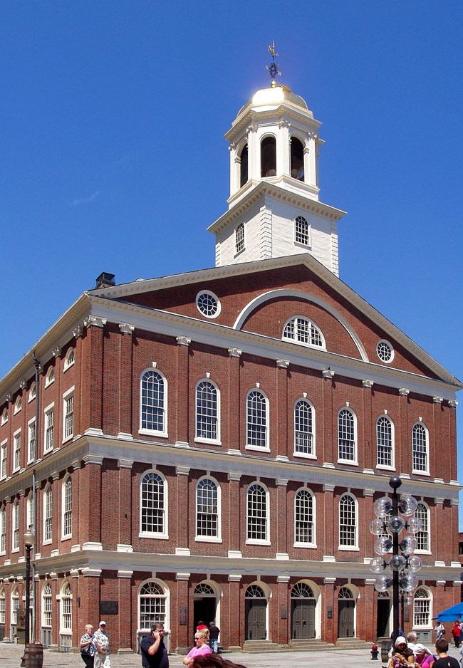 Color photo of the exterior of Faneuil Hall
