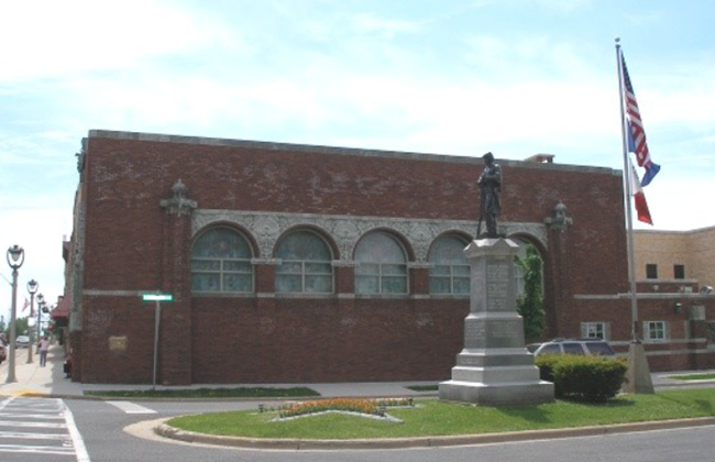 Farmers' & Merchants' Union Bank Brick building with arched windows.