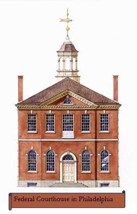 The federal courthouse in Philadelphia, a brick two story colonial building.