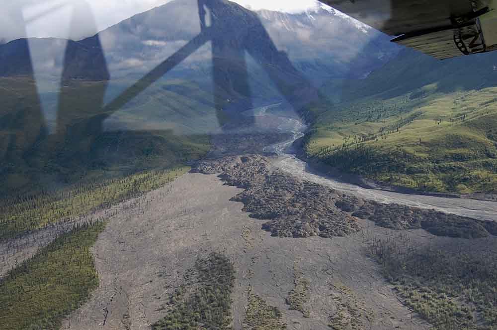 A view from a plane window of a large debris flow.