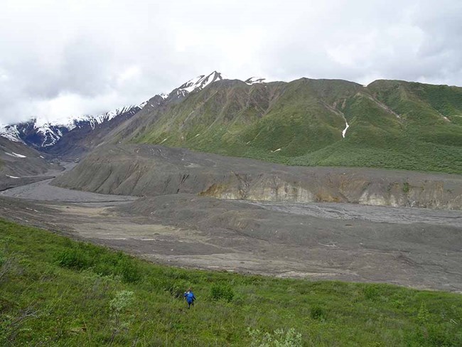 Flat Creek with a researcher in the foreground for scale.