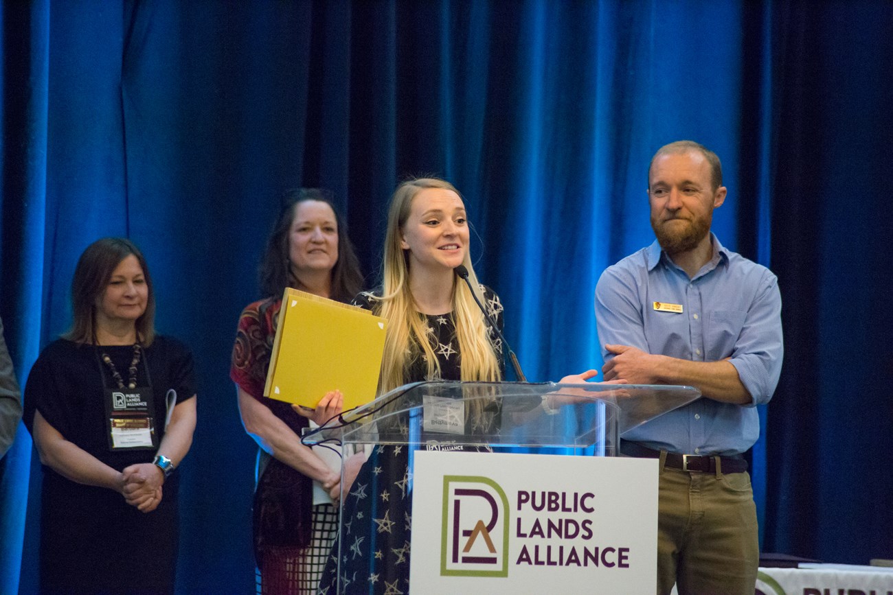 Bettymaya Foott gives an acceptance speech at the Public Lands Alliance award ceremony.