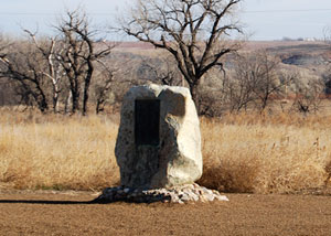 White rock with a plaque.