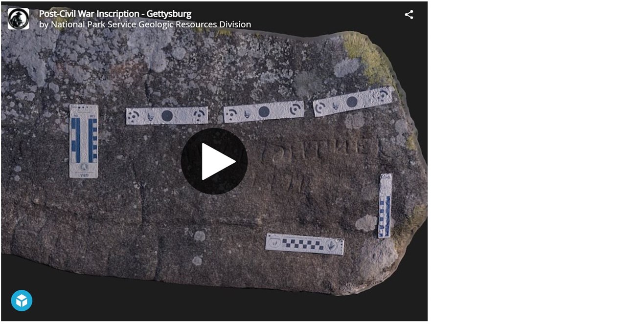 3d model of a rock with etched signatures