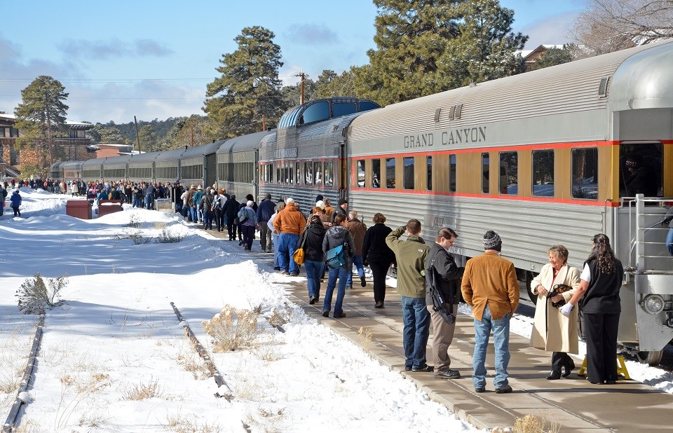 GRCA Grand Canyon Railway People standing next to Grand Canyon Railway