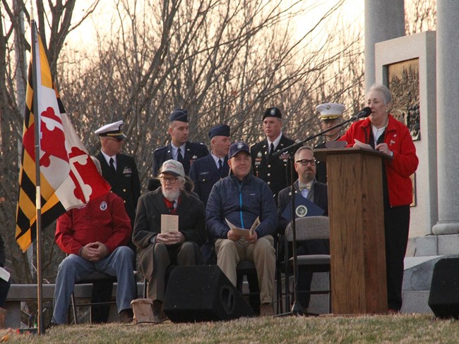 Georgene Charles, recipient of a 2017 George and Helen Hartzog Award for Outstanding Volunteer Service. Woman standing at a podium addressing a seated crowd.