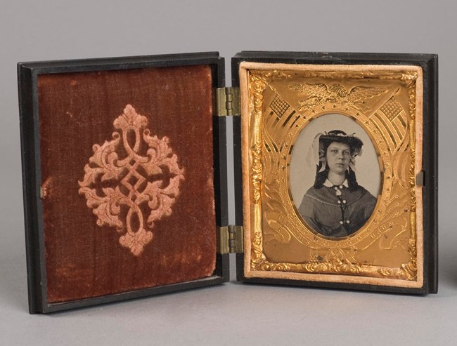 case with portrait of Agnes Suiter