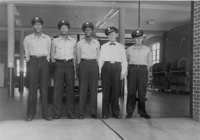 B & W image of Black firefighters and thier white officer