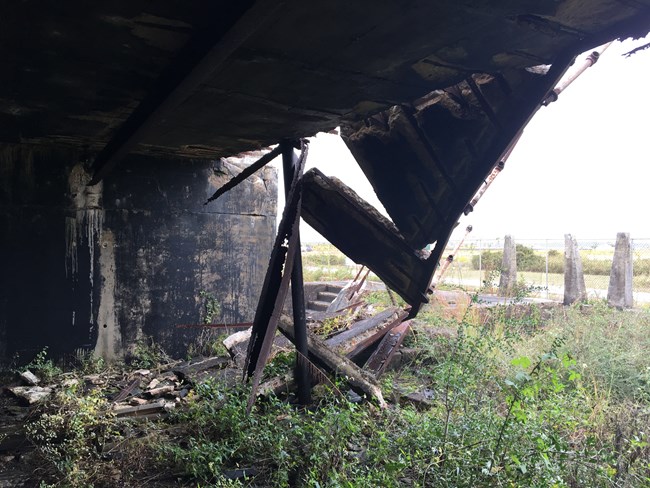 Concrete falls from a elevated position.