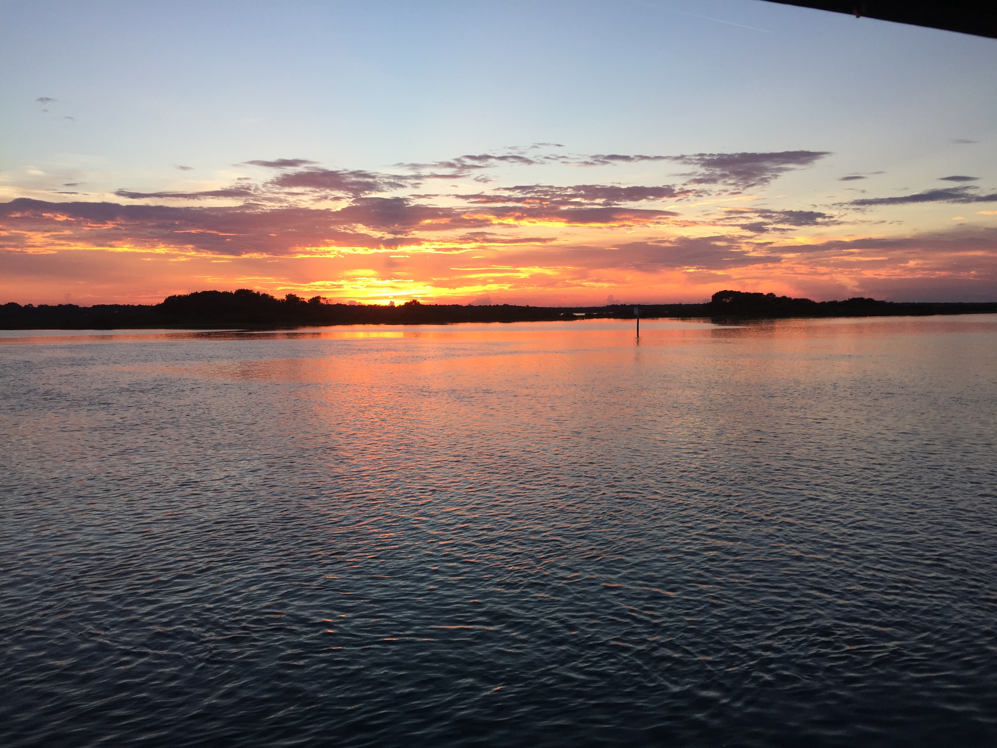 Sunset over the water.