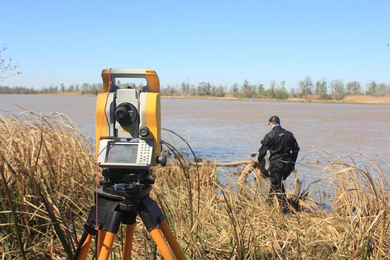 Maps of the Twelvemile Island wreck were made using GPS and a total station. SEAC Director David Morgan is at the exposed timbers of the wreck