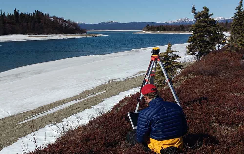 IMG_20170414_160657780_web A researcher uses survey equipment along the lake edge.