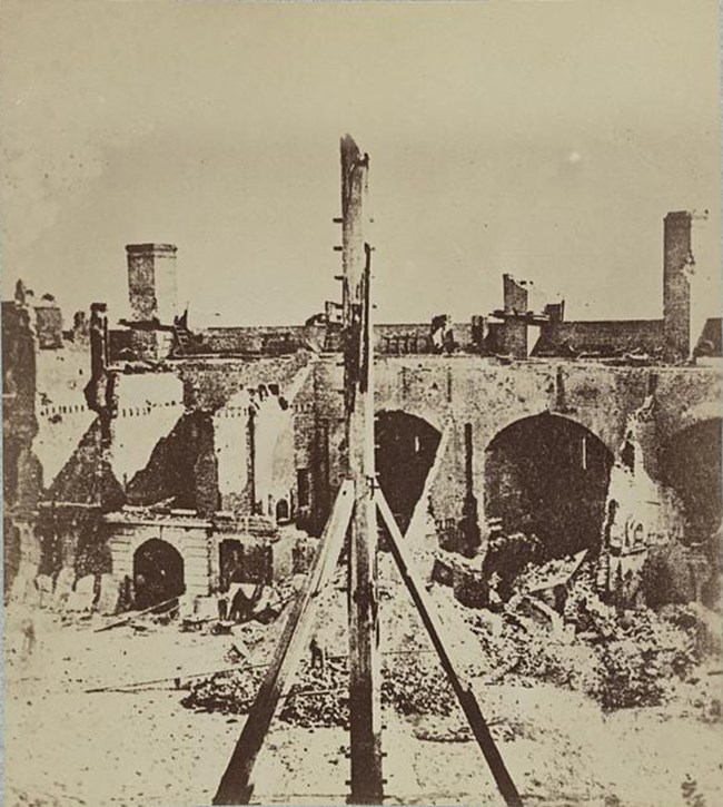 Interior photograph of damaged Fort Sumter, showing gorge wall and sallyport