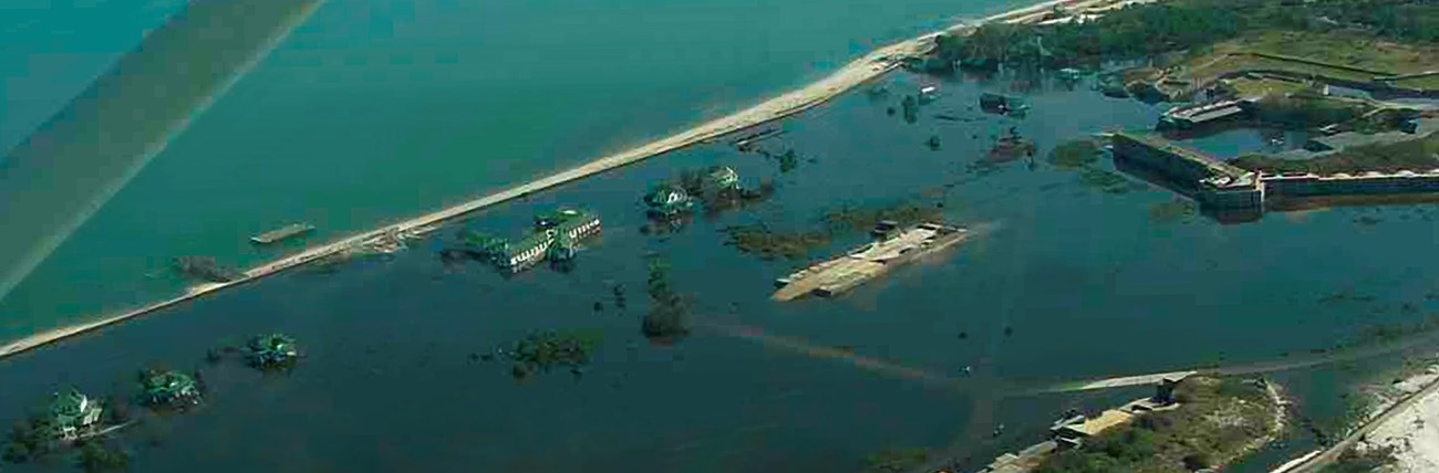 Ivan Surge_cropped Aerial photo showing flood waters within the Fort Pickens historic district