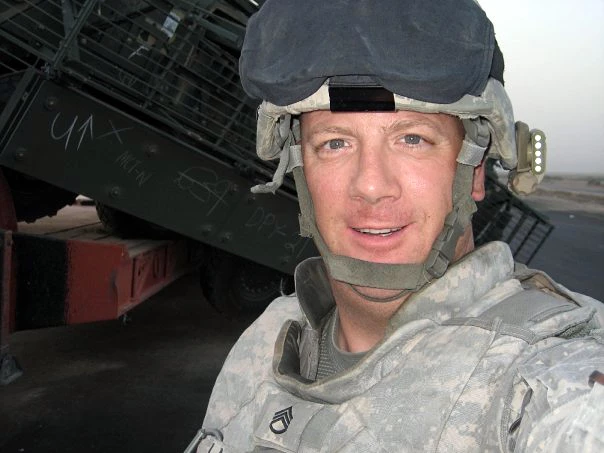 La Spina solder with kevlar near armored vehicle