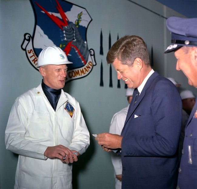 The president receives a gift from an air force officer
