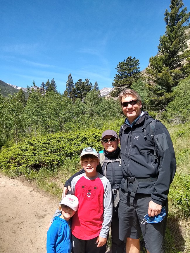 Joel Siderius and his family hiking at Rocky Mountain National Park.