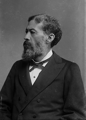 Black and white portrait of an African-American man in a suit