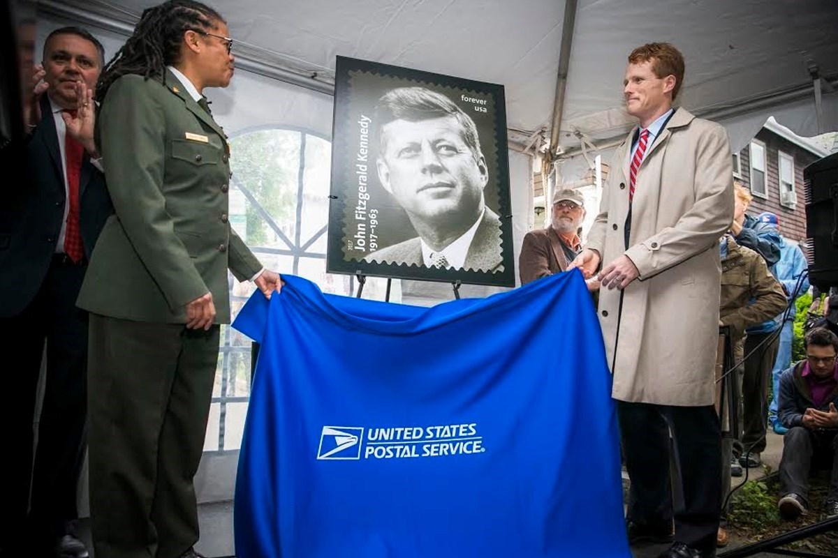 Stamp of John F Kennedy is unveiled.