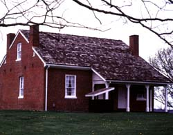 John Rankin House Small, brown house.