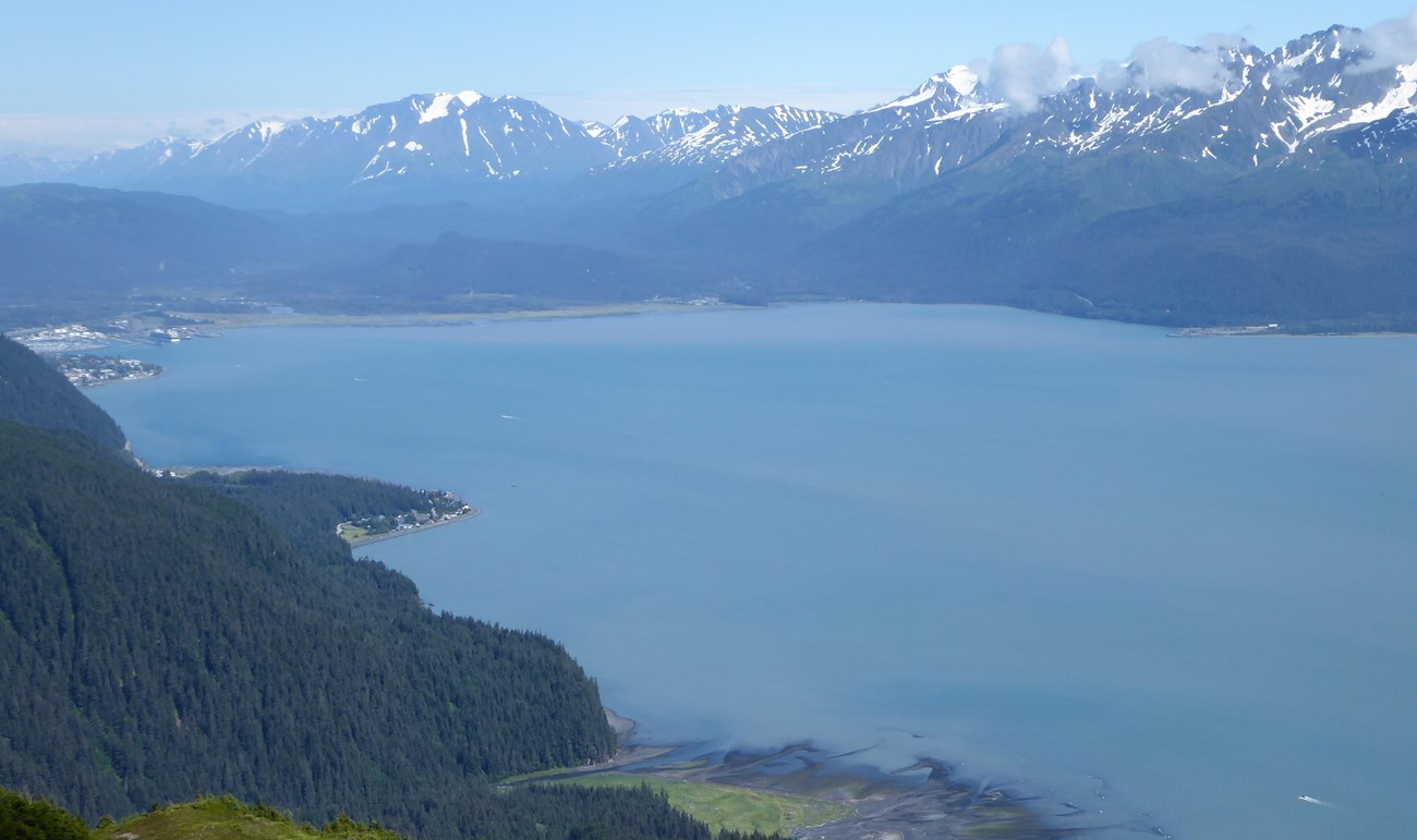KEFJ_2016_0897_head of Res Bay_NPS photo Mountains surrounding large a body of water