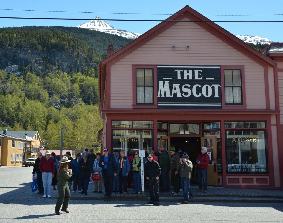 Ranger tour in front of a historic building