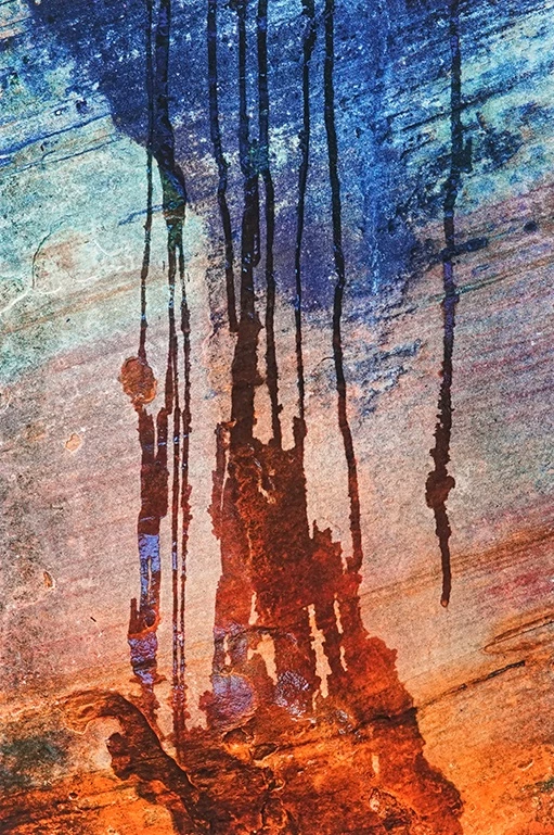 Kimmerle 2011 donated art Water dripping down colorful rock.