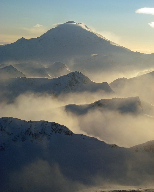 winter view of volcano and mountain ridges