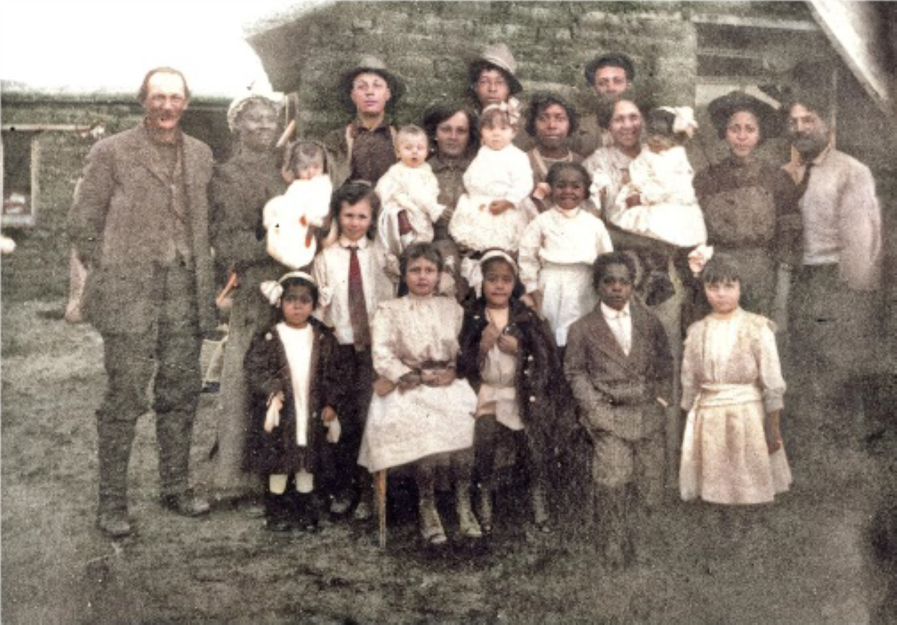 A large family stands together A large family stands together