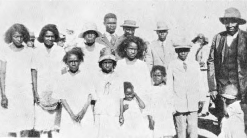 Black people of different ages standing side by side Black people of different ages standing side by side