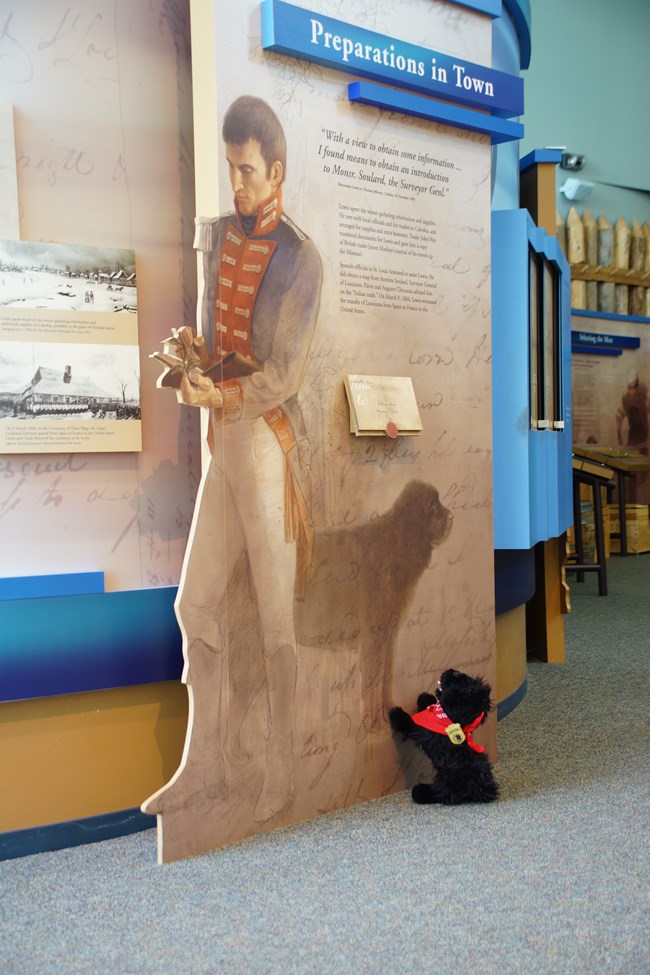 stuffed pup near interpretive display
