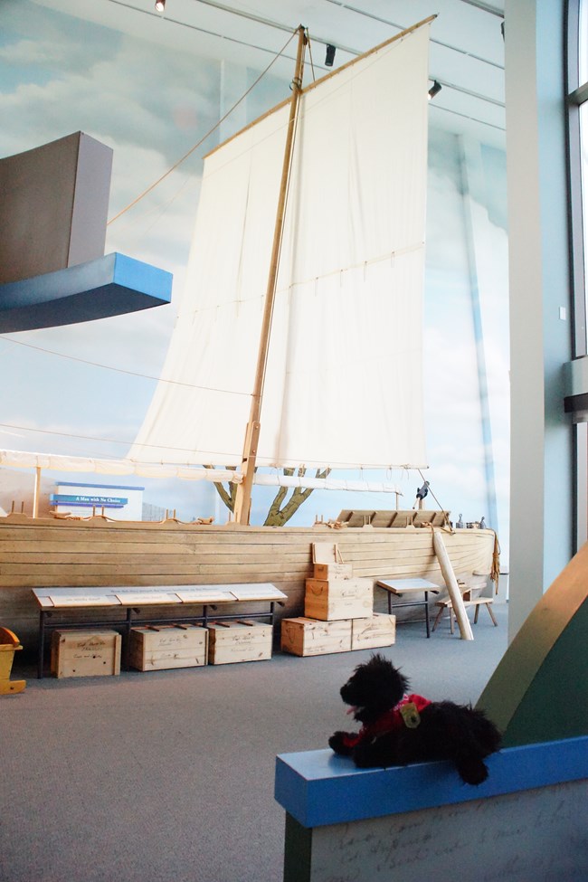 stuffed dog near keelboat