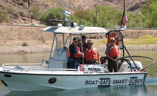 Law enforcement on patrol in a boat Law enforcement on patrol in a boat