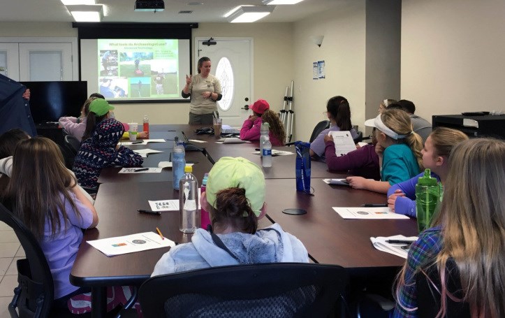 Archeologist giving presentation about archeology at Fort Frederica National Monument